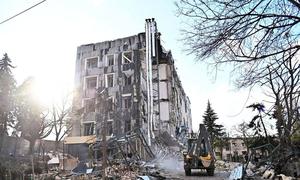 A building in Izyum, in the Kharkiv region of Ukraine lies in ruins after being struck by a missile. 