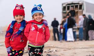 Syrian refugee s receive winter clothing kits in Jordan. (file)