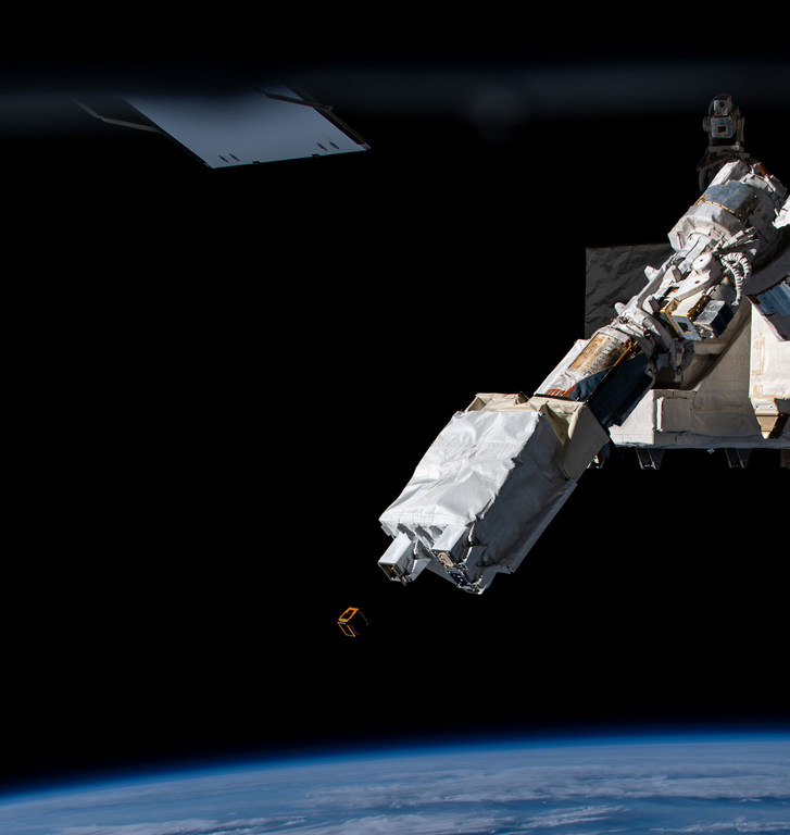 The SS-1 satellite being deployed from the International Space Station