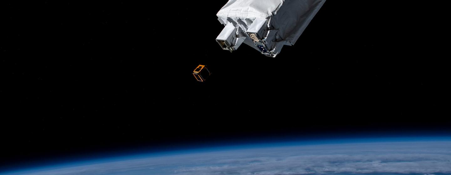 The SS-1 satellite being deployed from the International Space Station
