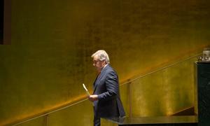 UN Secretary-General António Guterres walks to the podium to address the opening of  General Assembly debate.