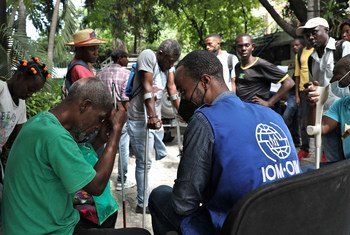 IOM distributed crutches and wheelchairs to people with disabilities. 