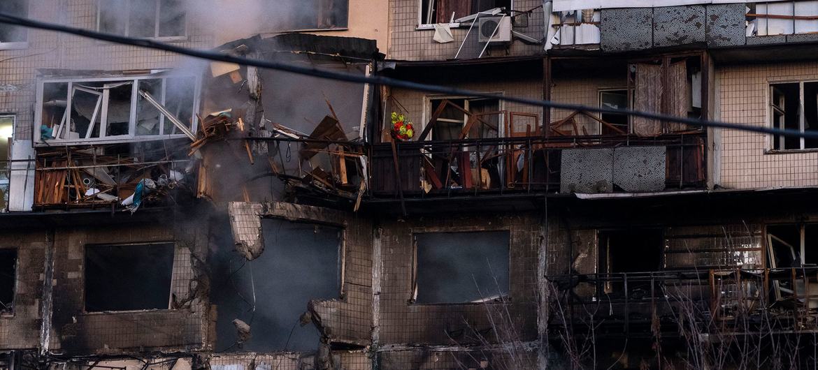 Smoke rises from a residential building in Kyiv following an overnight attack.