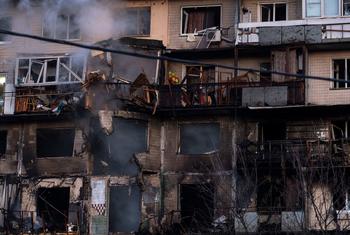 Smoke rises from a residential building in Kyiv following an overnight attack.