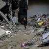 A  5-year-old plays in front of his destroyed house in Sheikh Zayed City, in the north of the Gaza Strip.