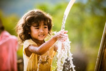 A young girl in Ninh Thuan, Viet Nam, washed her hands in clean, safe water.