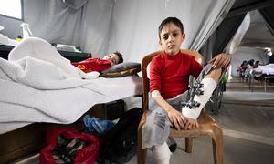 Children at a temporary field hospital in southern Gaza Strip.