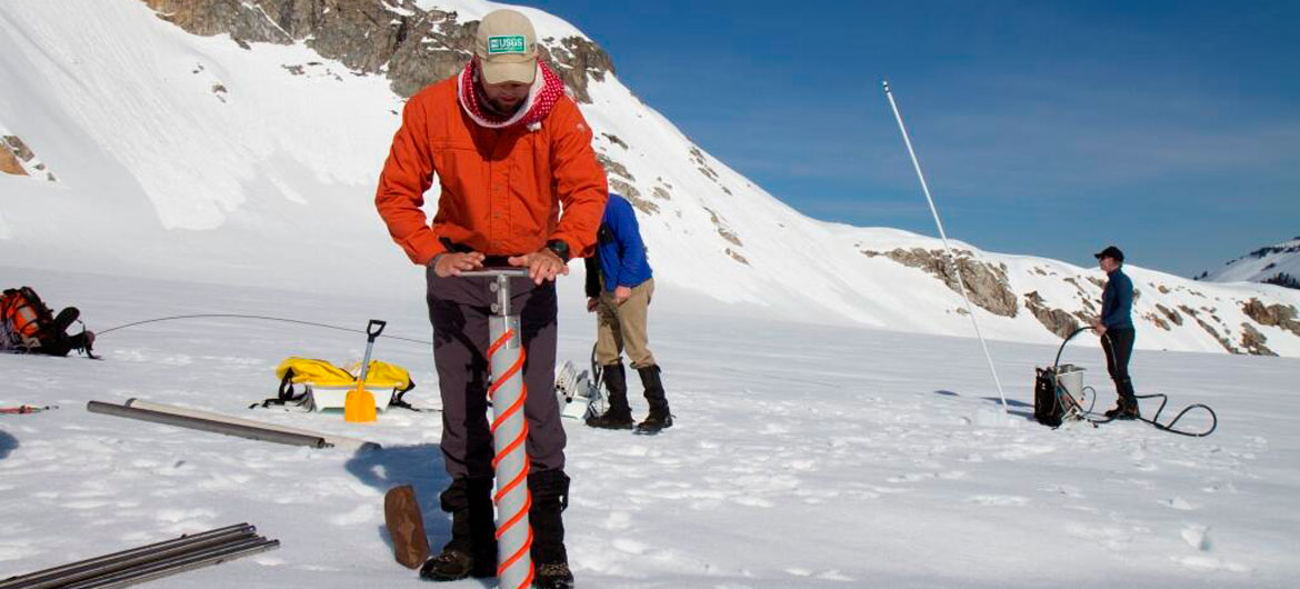 Scientists collecting data on South Cascade Glacier in the US state of Washington.