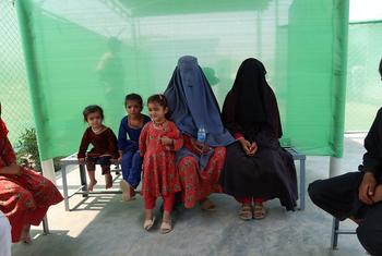 A group of Afghan women and girls returnees at a health clinic. Many face vulnerabilities such as inadequate shelter and limited healthcare access.