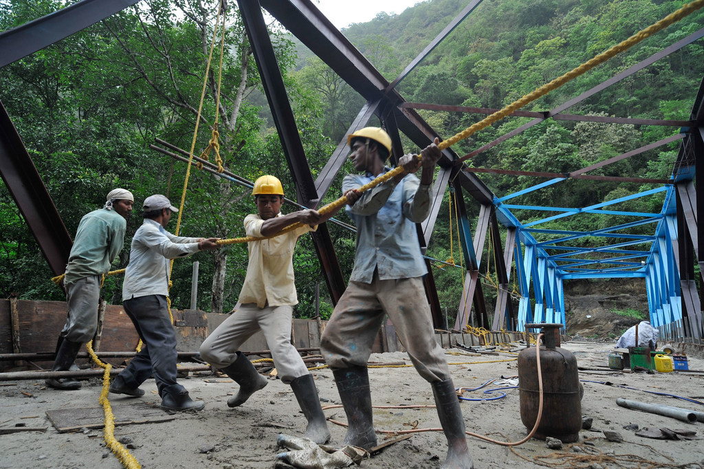 In landlocked countries like Bhutan (pictured), roads are a vital lifeline. But limited and costly transport infrastructure restricts mobility, inflates trade costs, and hinders access to markets, education, and healthcare.