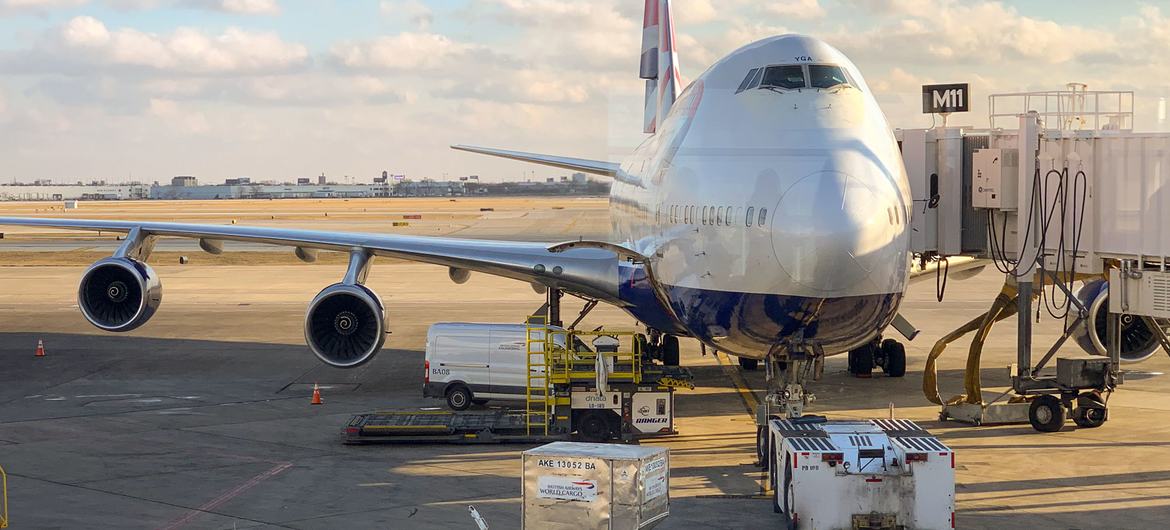 A British Airways 747 is prepared at an O'hare International Airport terminal for London, UK..