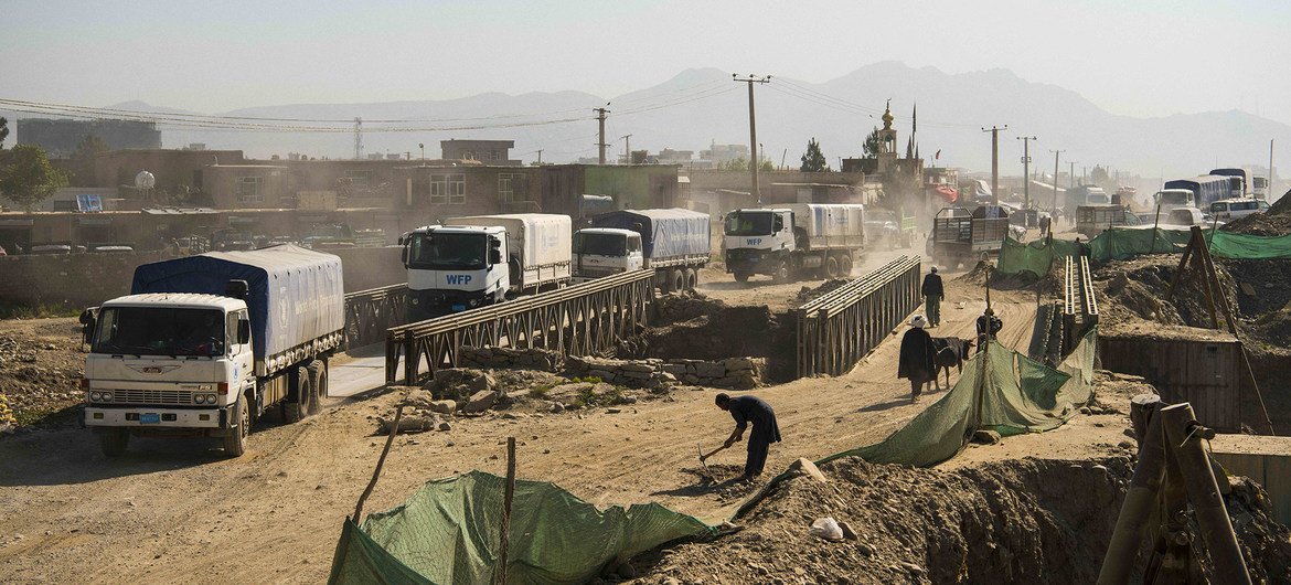 Trucks from the UN's World Food Programme leave Kabul in May 2021 to deliver food to vulnerable communities.