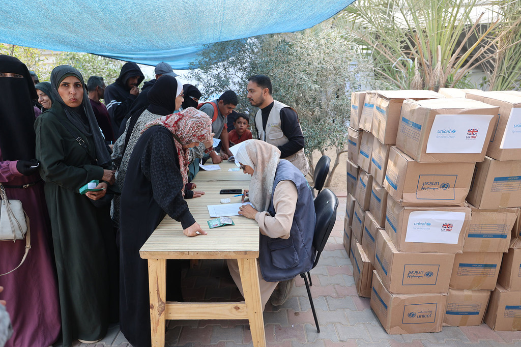 Women in Gaza receive aid from international organizations including the UN.