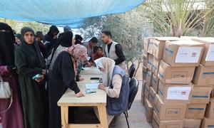 Women in Gaza receive aid from international organizations including the UN.