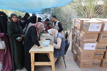 Women in Gaza receive aid from international organizations including the UN.
