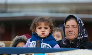 Families arriving at a reception centre in Ar-Raqqa city, Syria, on 4 December 2024