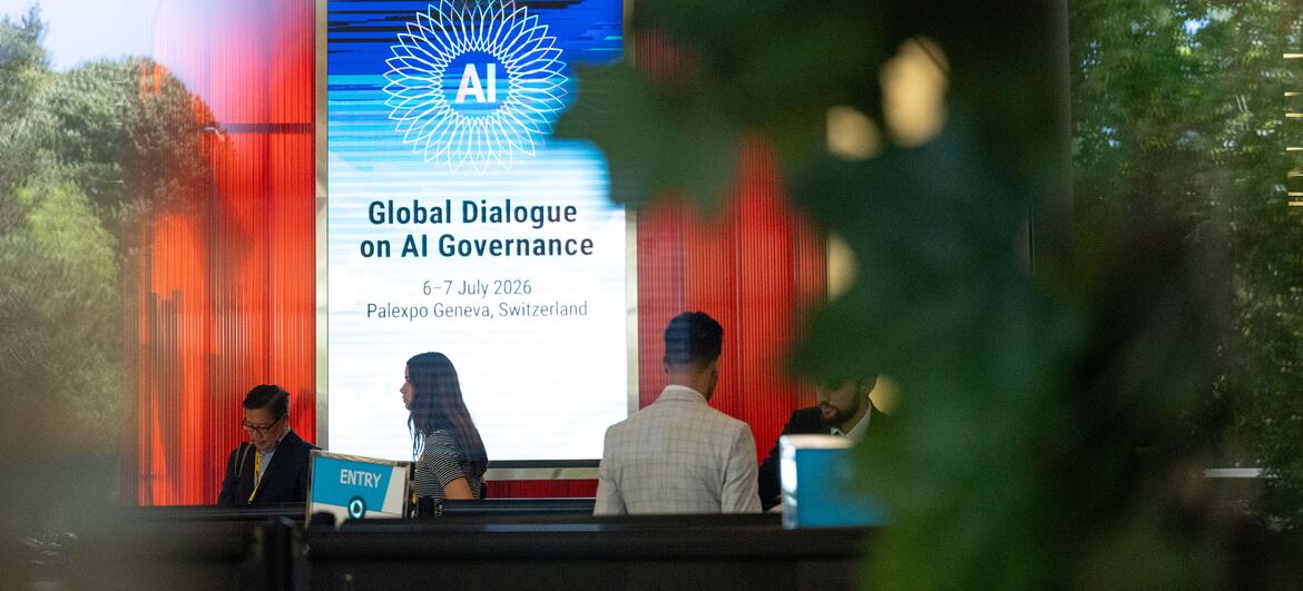 People at the entrance of the Global Dialogue on AI Governance at Palexpo, Geneva, Switzerland.