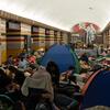 Families shelter in a crowded Kyiv metro station during an overnight air raid attack.