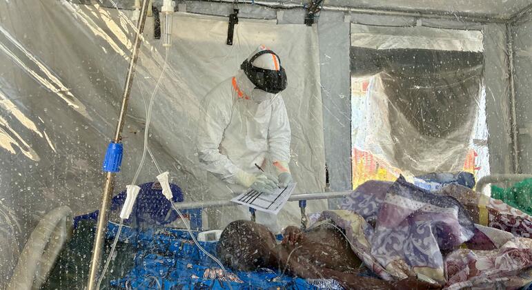 A patient is carried at an Ebola treatment centre in the Democratic Republic of the Congo.