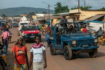 A UN patrol passes through a market area of a town in the Central African Republic.