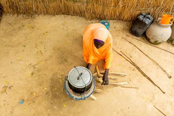 A woman cooks food in Maiduguri in northeastern Nigeria.