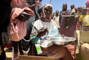 Aid is distributed in Zamzam camp in Tawila, North Darfur to people who fled their homes due to violence.