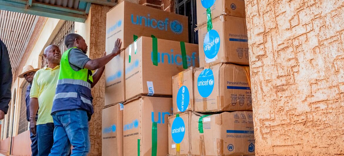 UNICEF staff in DR Congo deliver supplies to the Provincial Health Directorate in Bukavu. The boxes are labeled with the UNICEF logo and contain personal protective equipment for an Ebola response.