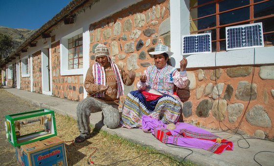 Villagers in the Peruvian village of Sibayo, use a solar-powered spinning machine.