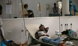 A woman suffering from cholera is treated at a hospital in Port-au-Prince, Haiti.