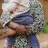 A young mother in the DR Congo, who was raped, holds her 18-month-old baby.
