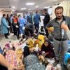 People wounded in bombardments wait to be treated at Al Shifa Hospital, in Gaza City (file).