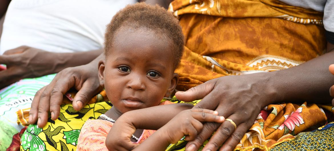 A child waits for a malnutrition screening session in Northern Burkina Faso. (file)