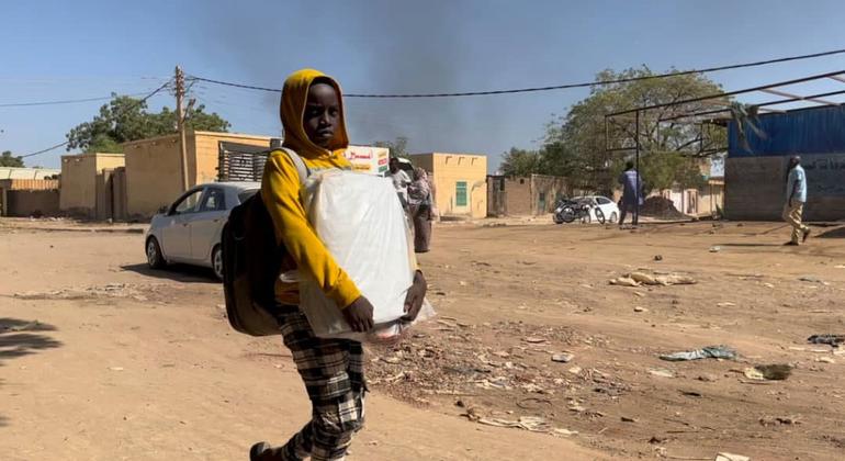 A child flees from Wad Madani, Al Jazirah state  east-central Sudan following armed clashes there. (file)