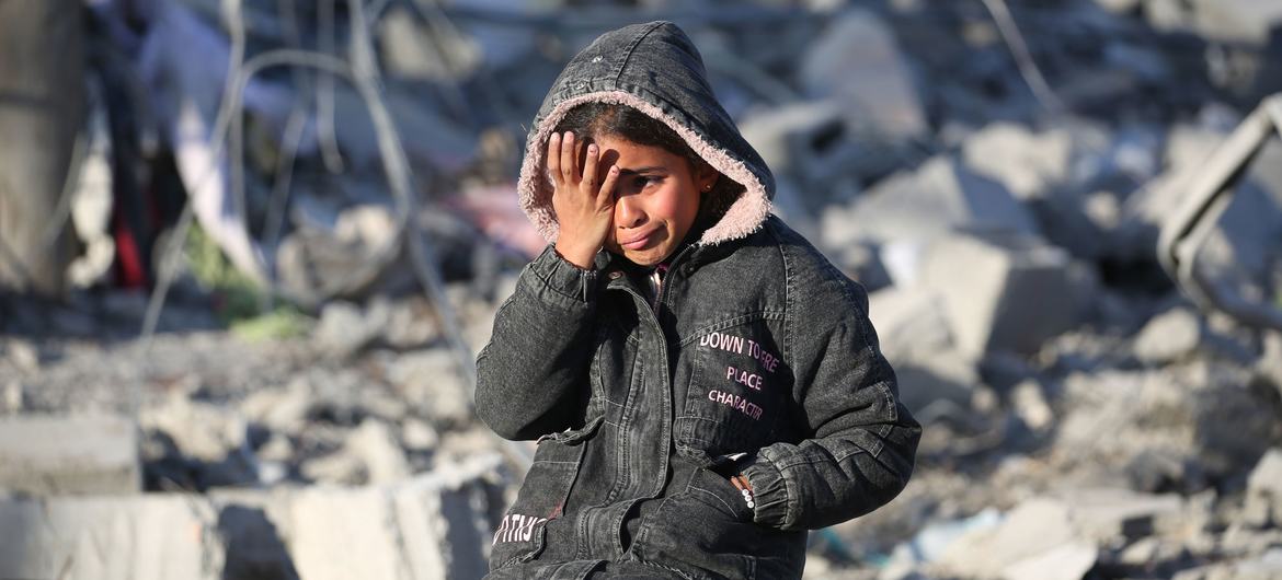 A girl stands amidst the rubble of her destroyed home in Rafah, Gaza. A girl stands amidst the rubble of her destroyed home in Rafah, Gaza.