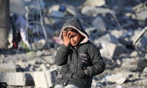 A girl stands amidst the rubble of her destroyed home in Rafah, Gaza.
