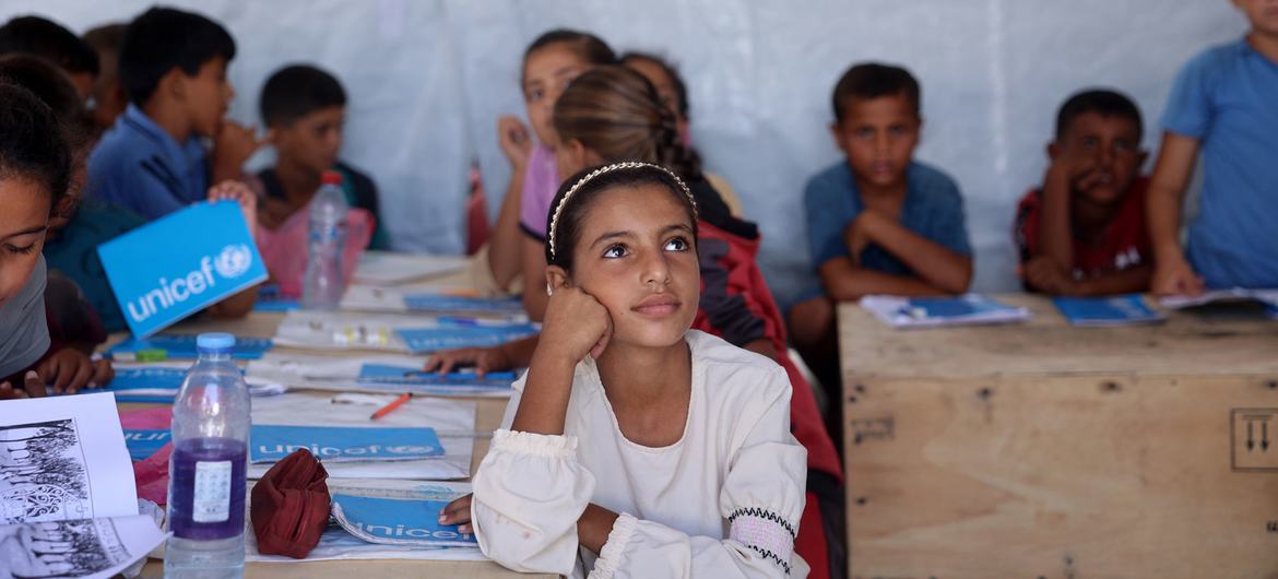 Children in Gaza study at a UNICEF safe learning centre.