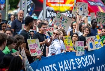 Climate activists voice their opinion outside the International Court of Justice (ICJ) in The Hague.