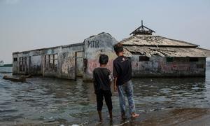 A mosque is partially submerged  in the Muara Baru neighbourhood of North Jakarta, Indonesia.