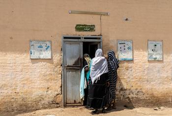 Women arrive at the Kosti Maternity Hospital.