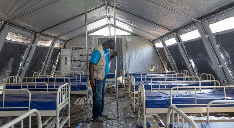A UNICEF worker supervises tent installations set up next to a hospital in Niamey, Niger, during the COVID-19 pandemic.
