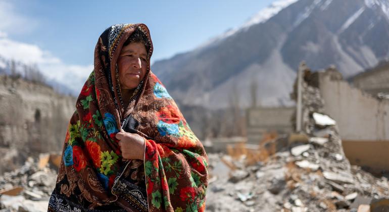 A villager walks among the ruins of his house in the town of Hasnabad in the Hunza Valley. Hasanabad was hit by floodwaters after a glacial lake burst in May 2022, destroying many houses. A villager walks among the ruins of his house in the town of Hasnabad in the Hunza Valley. Hasanabad was hit by floodwaters after a glacial lake burst in May 2022, destroying many houses.