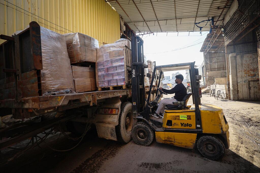 Разгрузка гуманитарной помощи в Газе (архив). 