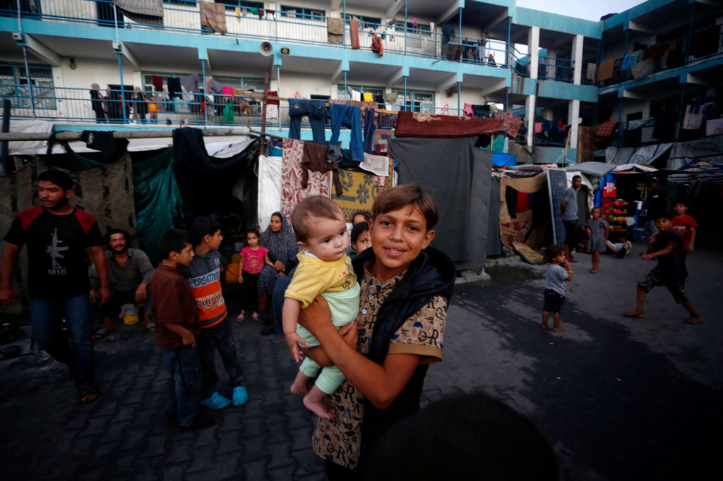 Families in Gaza continue to live in schools turned into shelters.