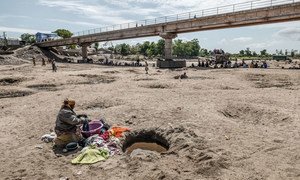 The dried out Manambovo river in Madagascar where the community has to use the remaining stagnant water to hydrate their cattle, wash their clothes and for their household. 