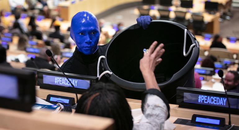 Blue Man Group performs during the International Day of Peace youth observance held on the theme 