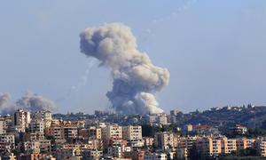 Smoke billows from a site targeted by shelling in the southern Lebanese village of Zaita.