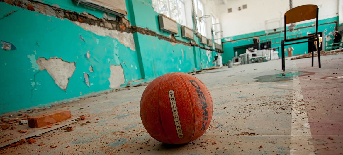 A basketball lies in a school gymnasium which was damaged during heavy shelling in the Kherson region of Ukraine. A basketball lies in a school gymnasium which was damaged during heavy shelling in the Kherson region of Ukraine.