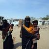 Des femmes et enfants dans un camp pour personnes déplacées par le conflit au Yémen.