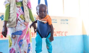 A child is screened for malnutrition at a UNICEF-supported health facility at a camp for displaced people in Zalingi, central Darfur.