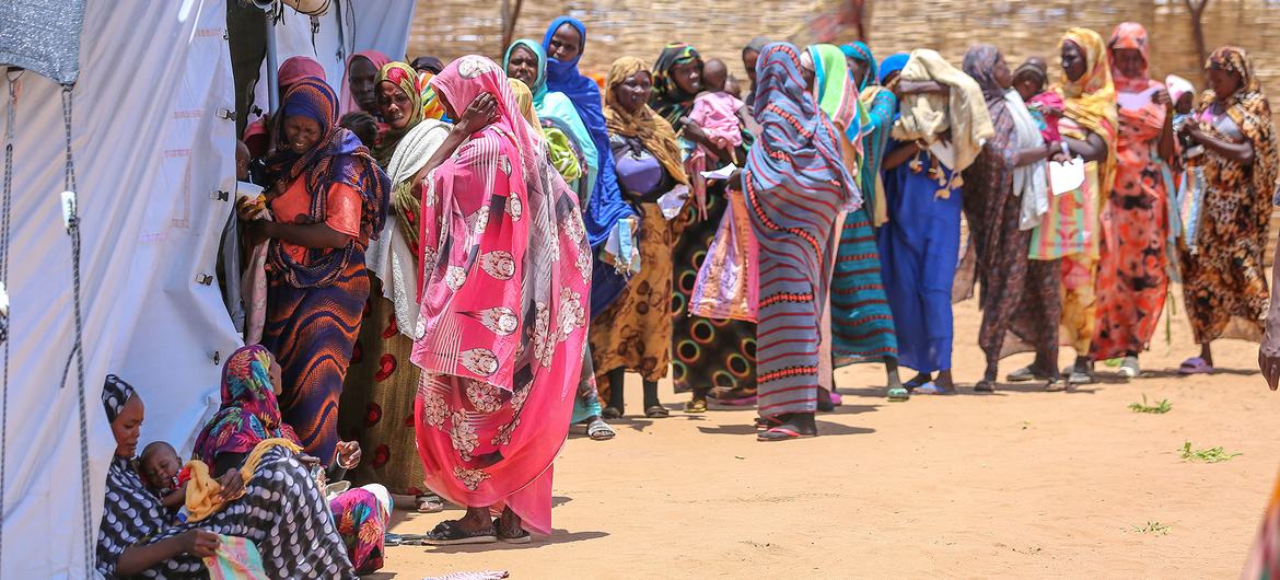 Women who fled the fighting in El Fasher wait for services at a UNFPA clinic in Tawila, Sudan.